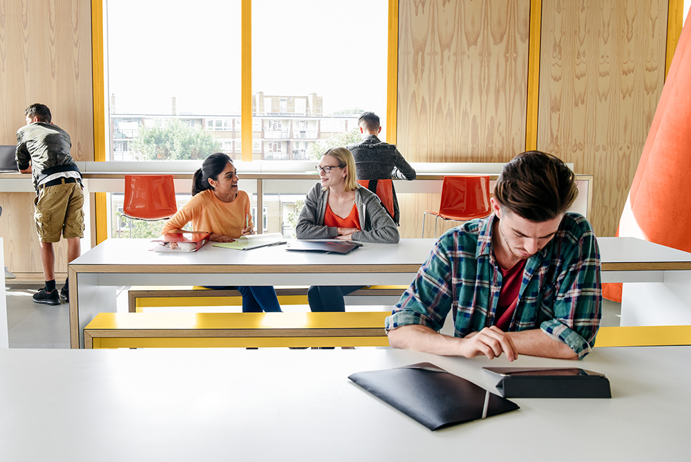 A classroom with students studying