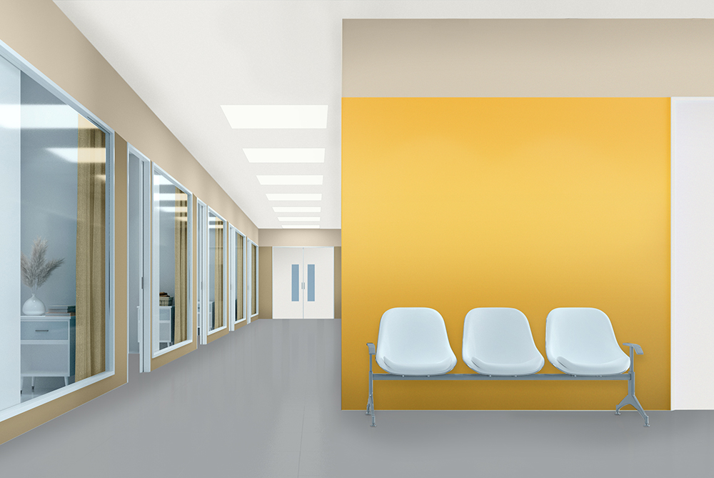 Waitingroom with white seats and yellow painted wall