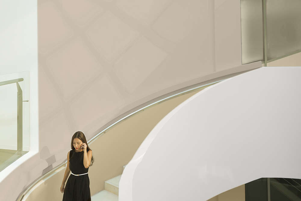 woman walks down stairs