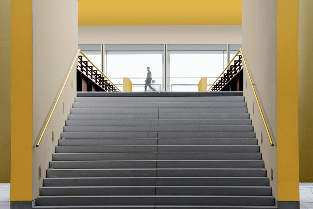 A stairwell with a wall painted using a split wall effect. 